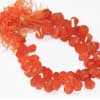 Natural Orange Carnelian Twisted Tear Drop Beads Strand Length 4 Inches and Size 14mm to 17mm approx.Carnelian is a brownish-red semi precious gemstone. It is found commonly in india as well as in south america. Also known for feng-shui and healing purposes. 